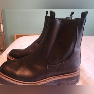 Gently used Black booties with tan trim